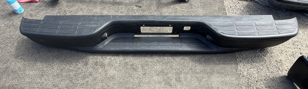 AS IS 99-06 CHEVY SILVERADO / GMC SIERRA BLACK REAR BUMPER MISSING BRACKETS AND HARDWARE