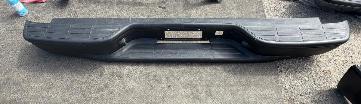AS IS 99-06 CHEVY SILVERADO / GMC SIERRA BLACK REAR BUMPER MISSING BRACKETS AND HARDWARE