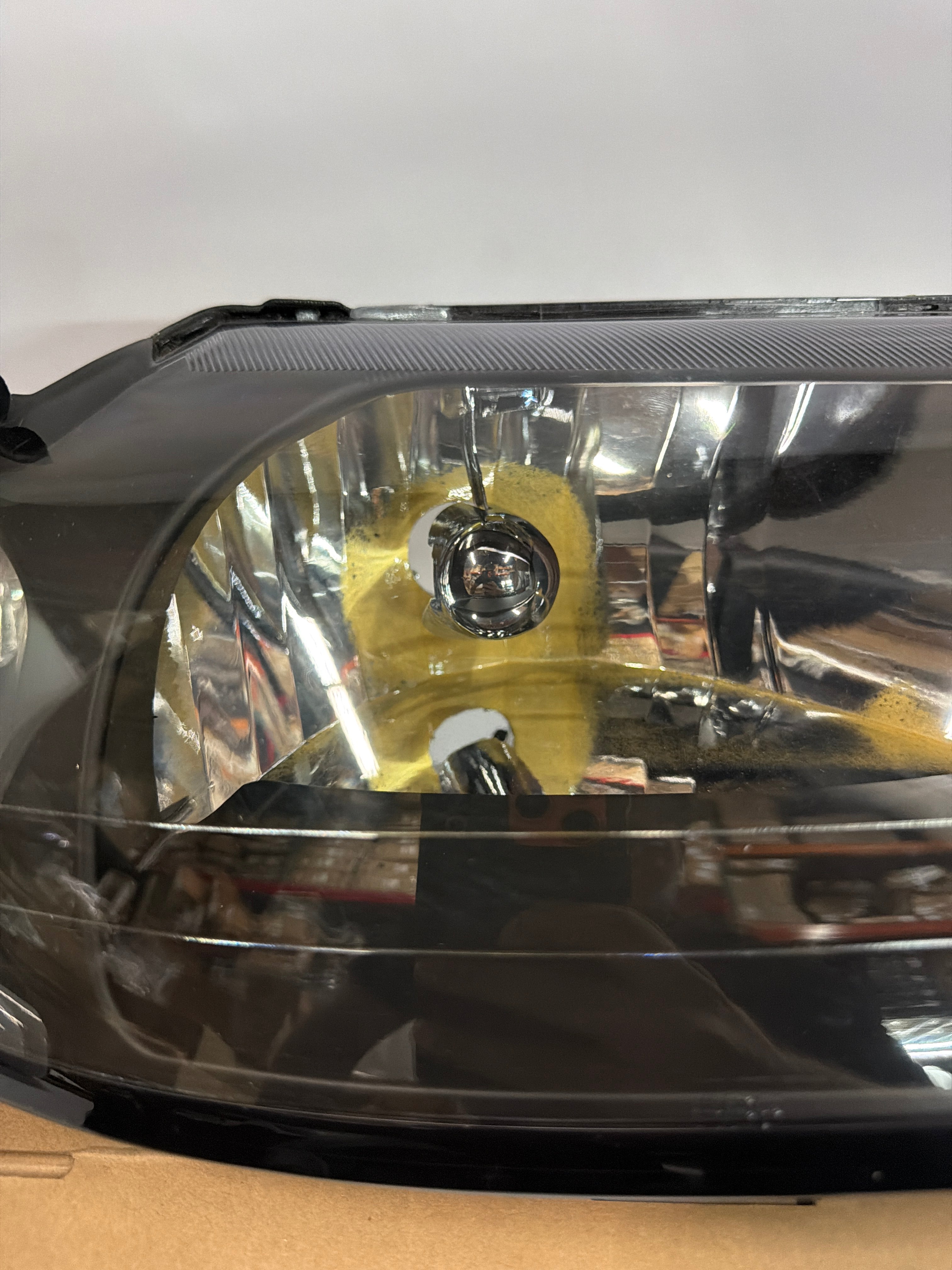 AS IS 99-04 FORD MUSTANG BLACK HOUSING AND CLEAR WITH CLEAR HEADLIGHTS