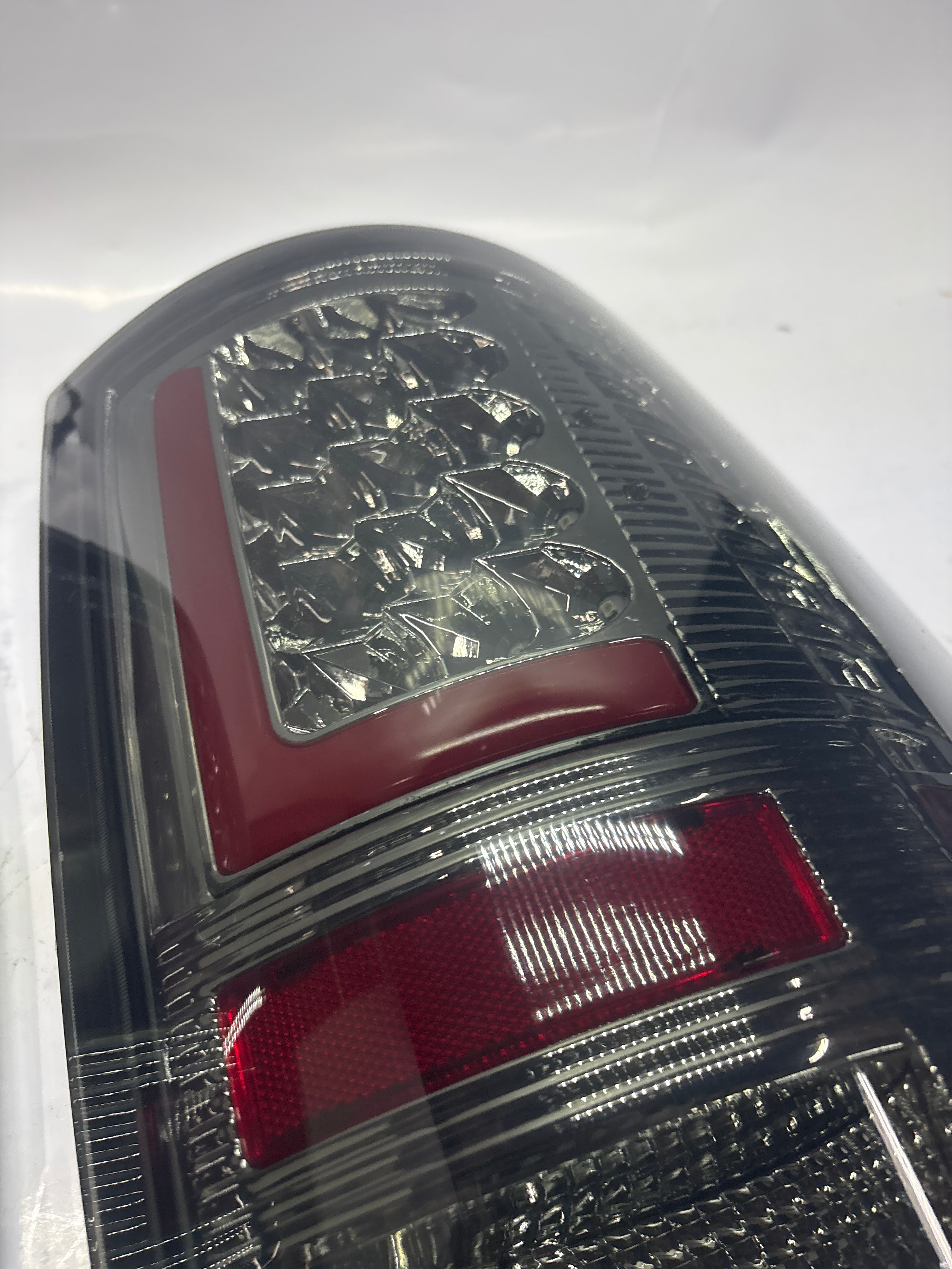 09-17 DODGE RAM 3D LED L-STYLE RED CHROME SMOKED TAILLIGHTS