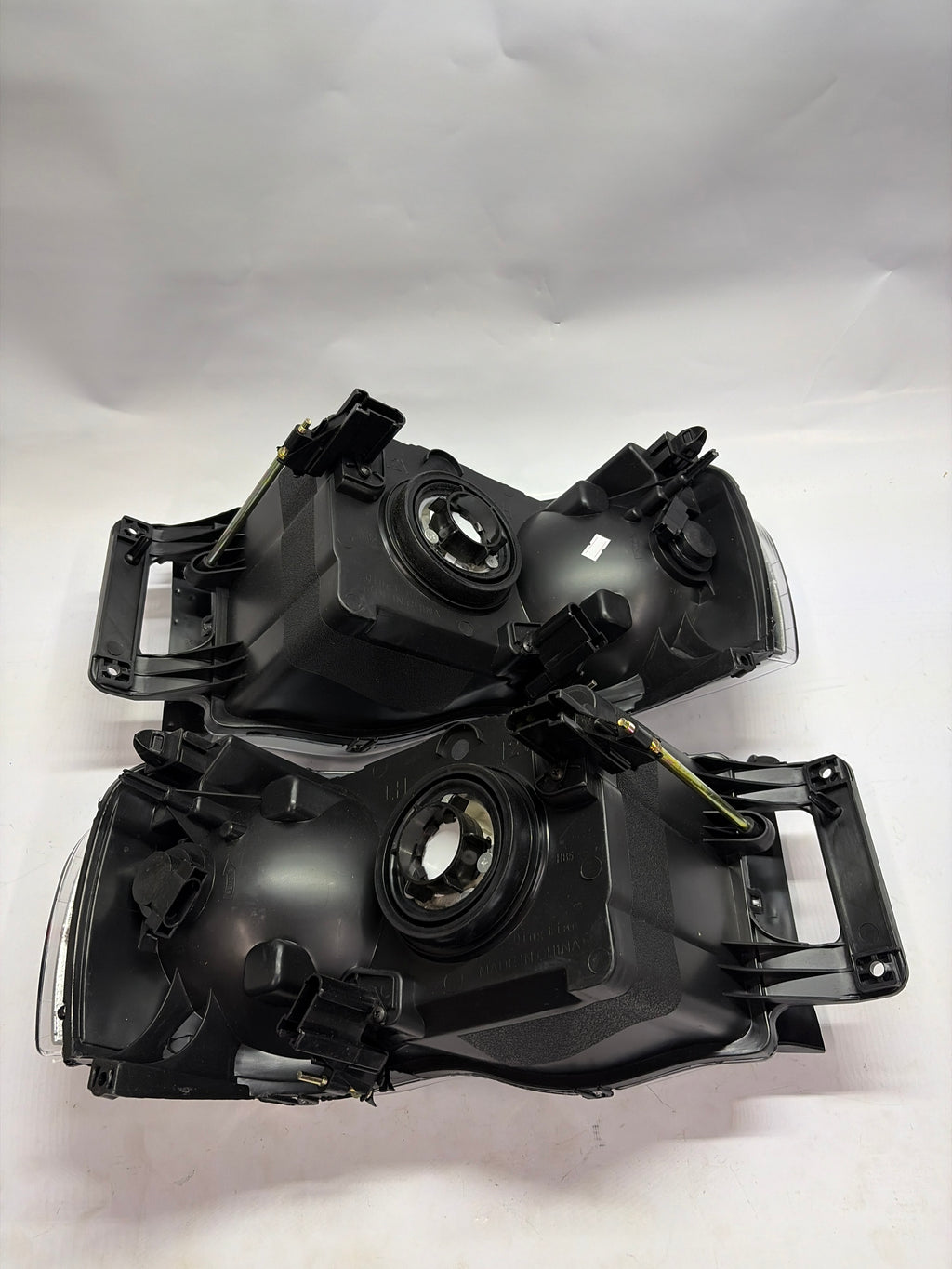 02-05 DODGE RAM 1500 black housing pair of headlights