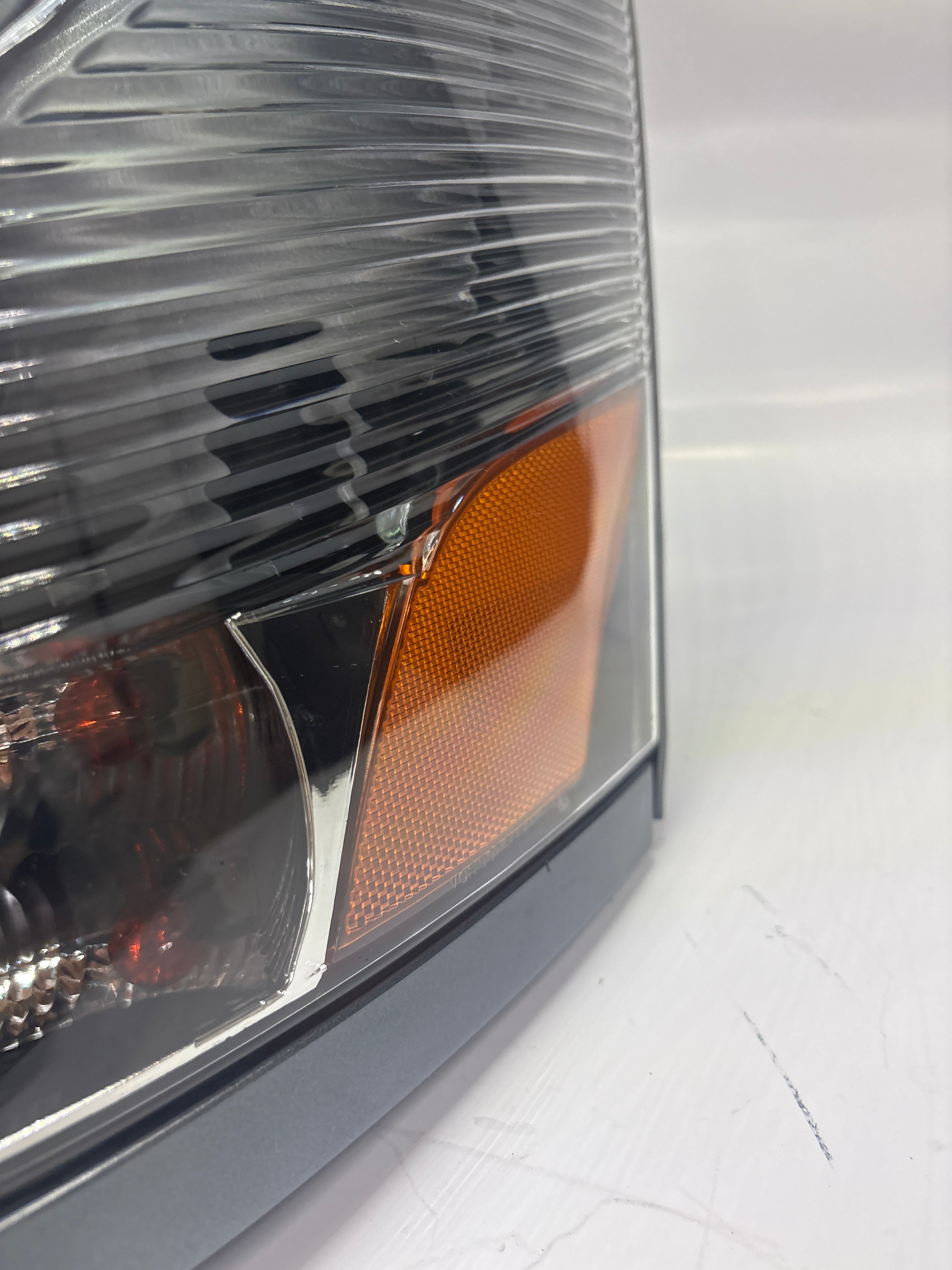 04-17 Volvo VNL Left Driver Side Black Amber Headlight