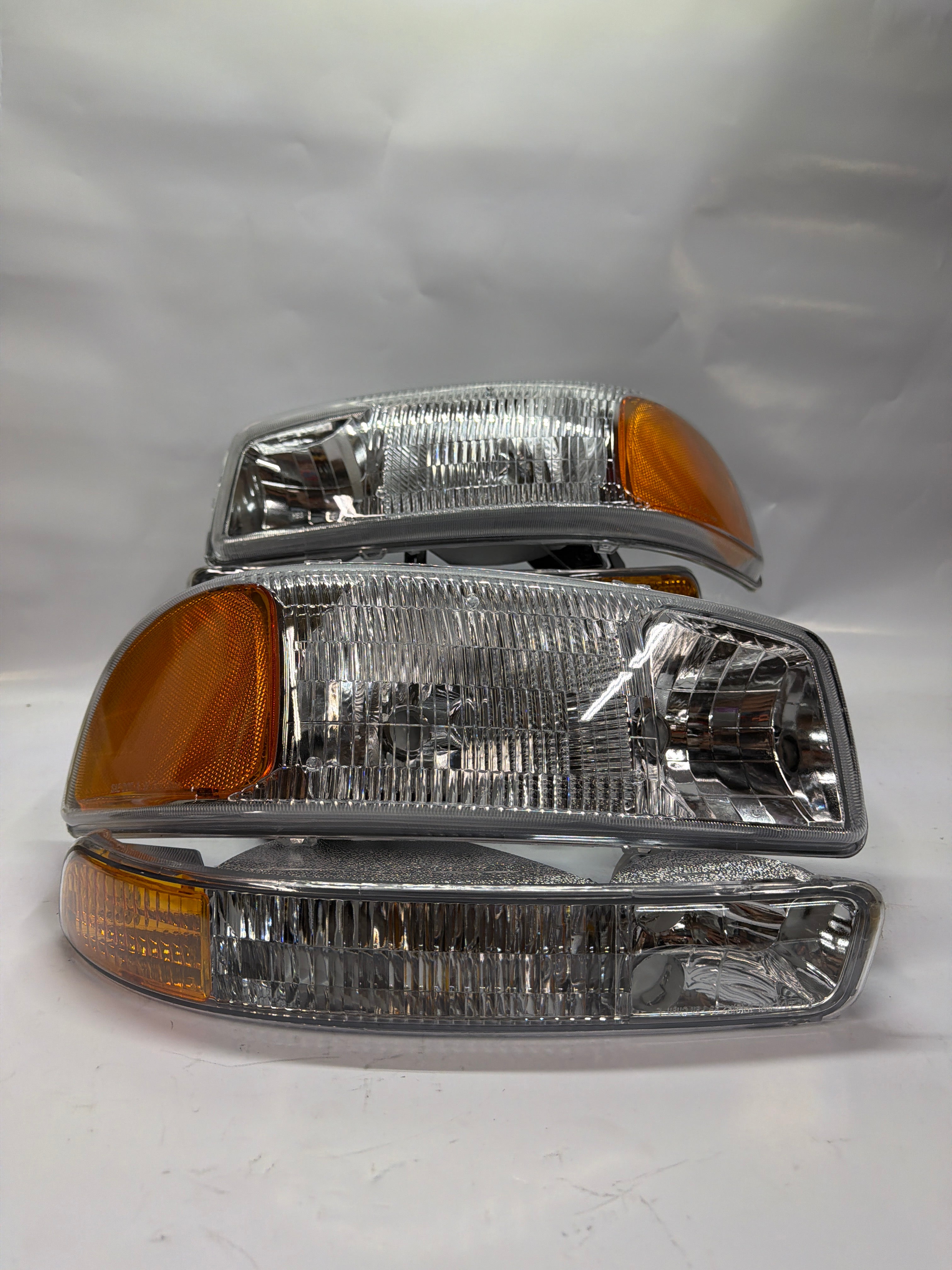 99-06 GMC SIERRA CHROME HOUSING WITH AMBER REFLECTOR HEADLIGHTS OE STYLE