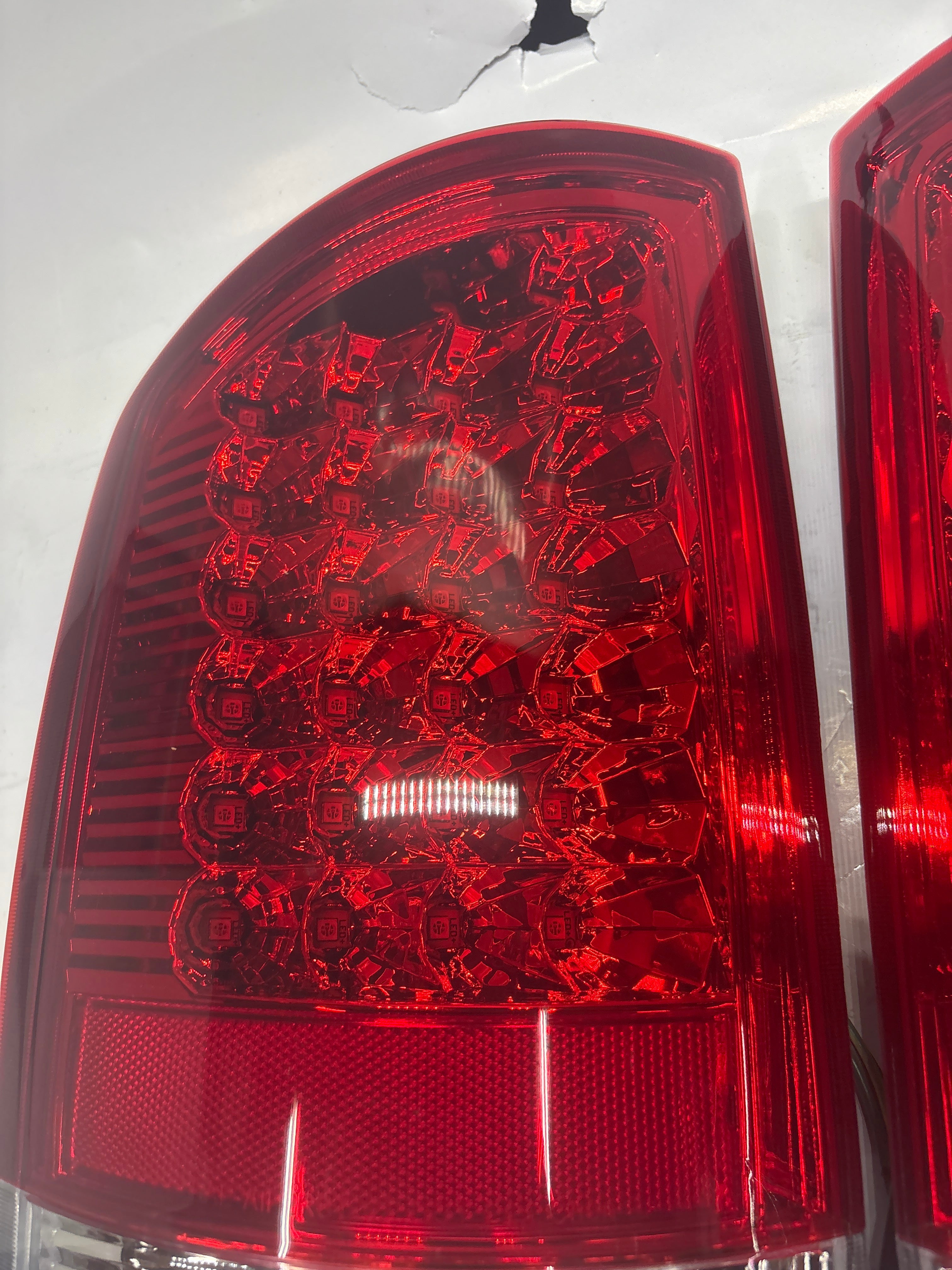 02-06 DODGE RAM red led taillights chrome