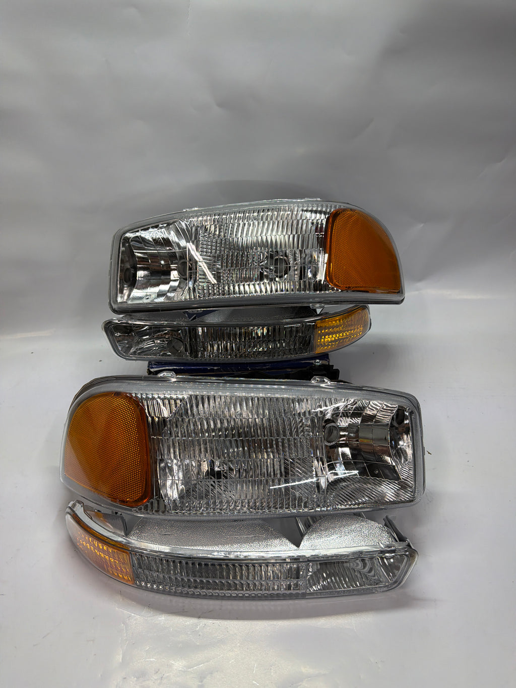 99-06 GMC SIERRA CHROME HOUSING WITH AMBER REFLECTOR HEADLIGHTS OE STYLE