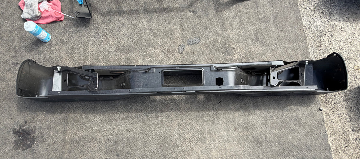AS IS 99-06 CHEVY SILVERADO / GMC SIERRA BLACK REAR BUMPER MISSING BRACKETS AND HARDWARE