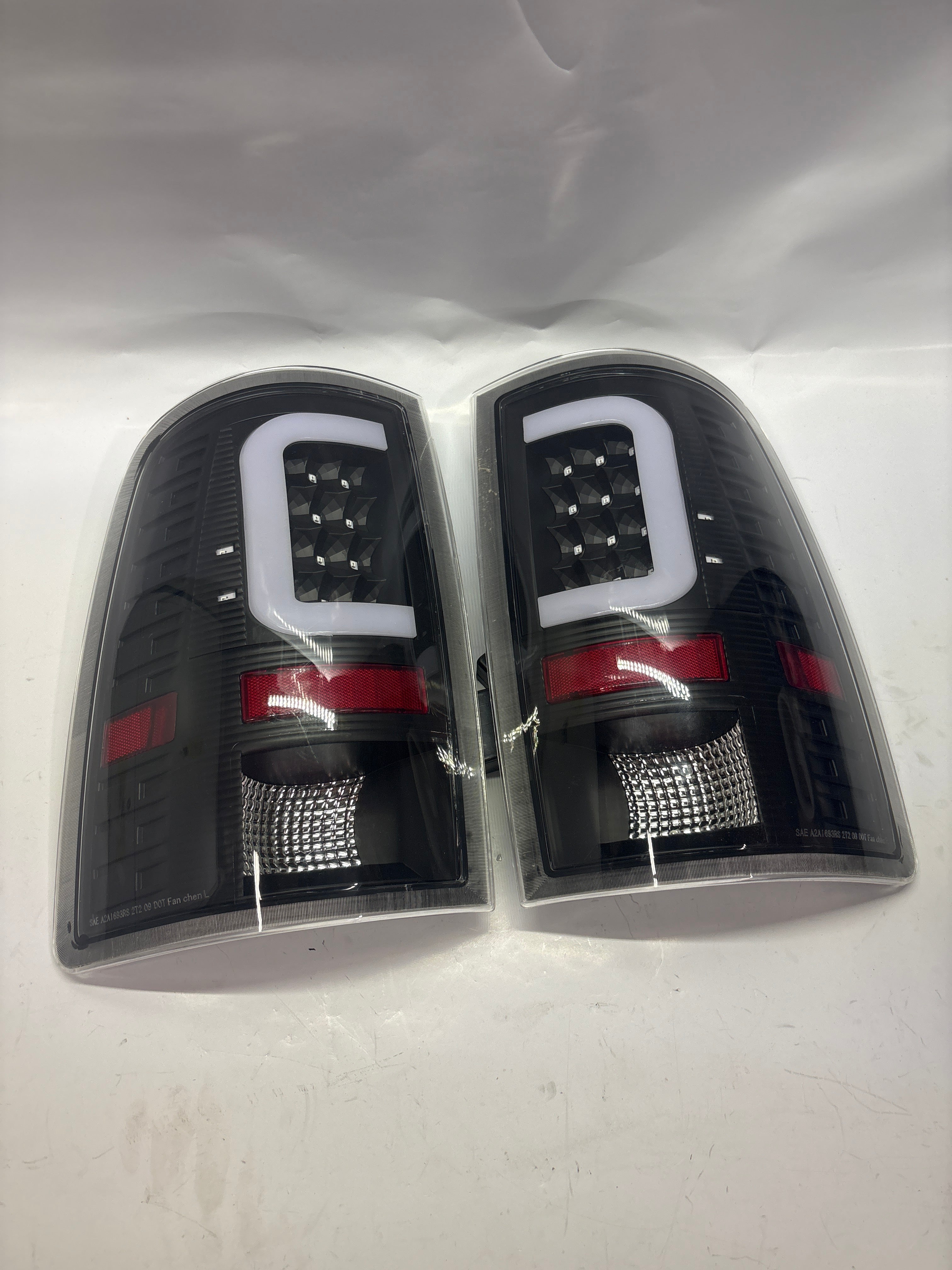 TL-DRAM09-LED-3D-BL-CL-ASIS 09-17 Dodge Ram Black Clear 3D LED AS IS USED Taillights