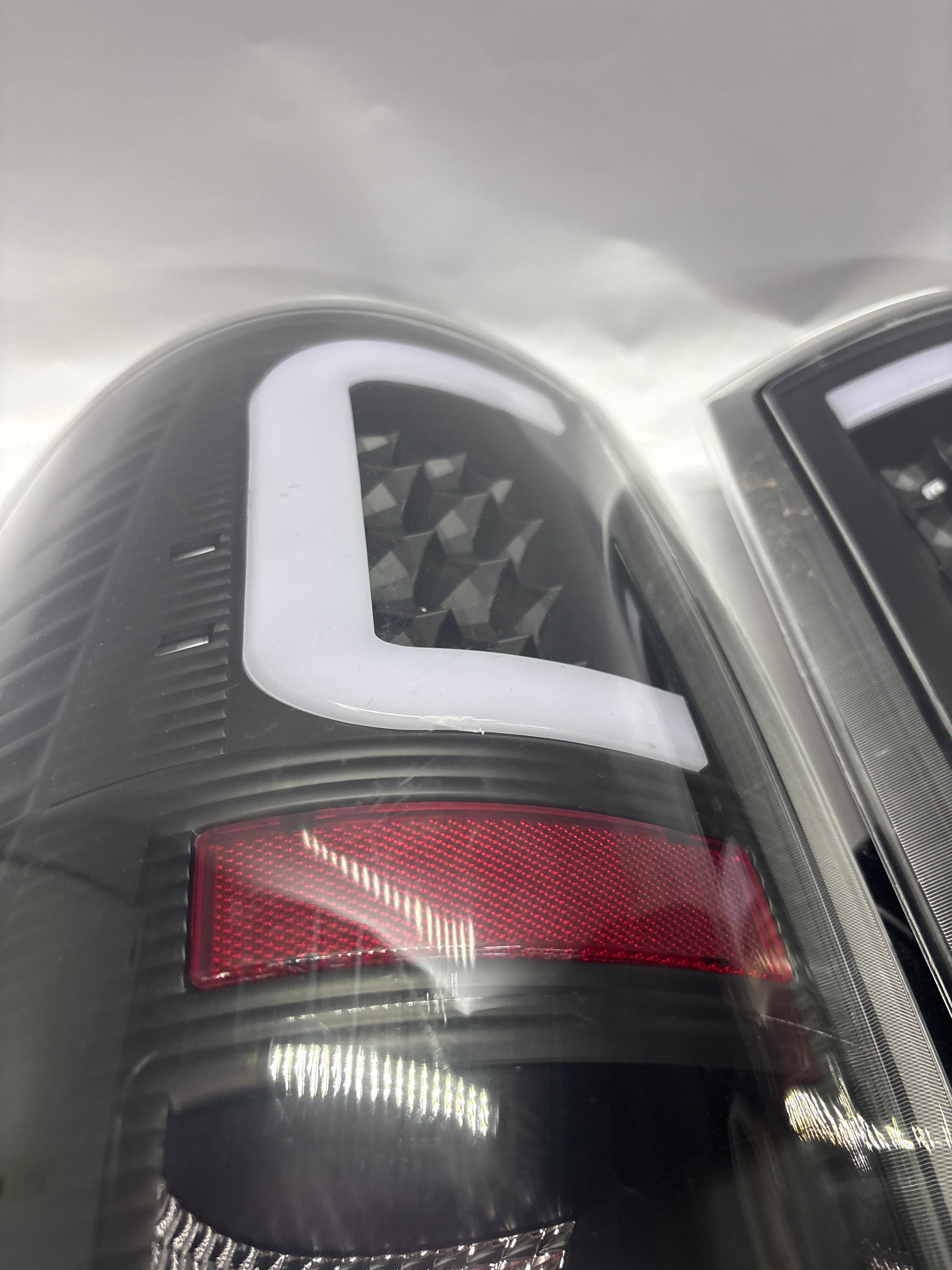 TL-DRAM09-LED-3D-BL-CL-ASIS 09-17 Dodge Ram Black Clear 3D LED AS IS USED Taillights
