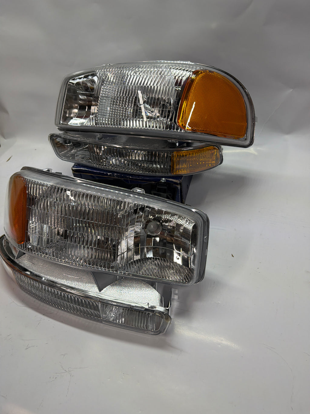 99-06 GMC SIERRA CHROME HOUSING WITH AMBER REFLECTOR HEADLIGHTS OE STYLE
