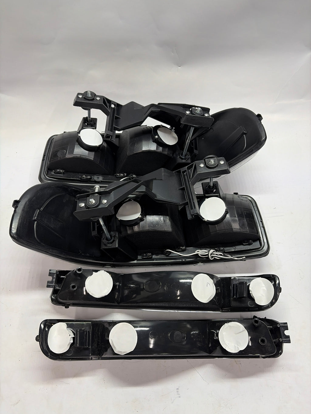 99-06 GMC SIERRA YUKON BLACK HOUSING WITH CLEAR LED