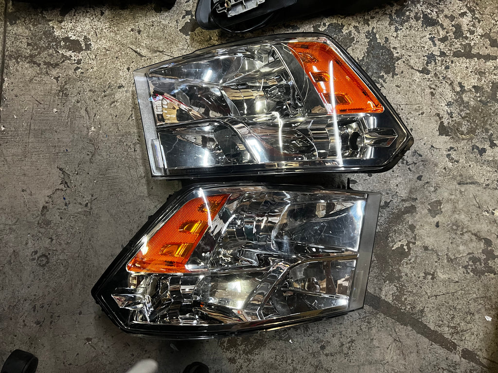 As is 09-17 dodge ram 1500 headlights