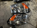 As is 09-17 dodge ram 1500 headlights