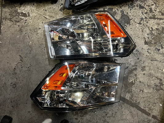 As is 09-17 dodge ram 1500 headlights