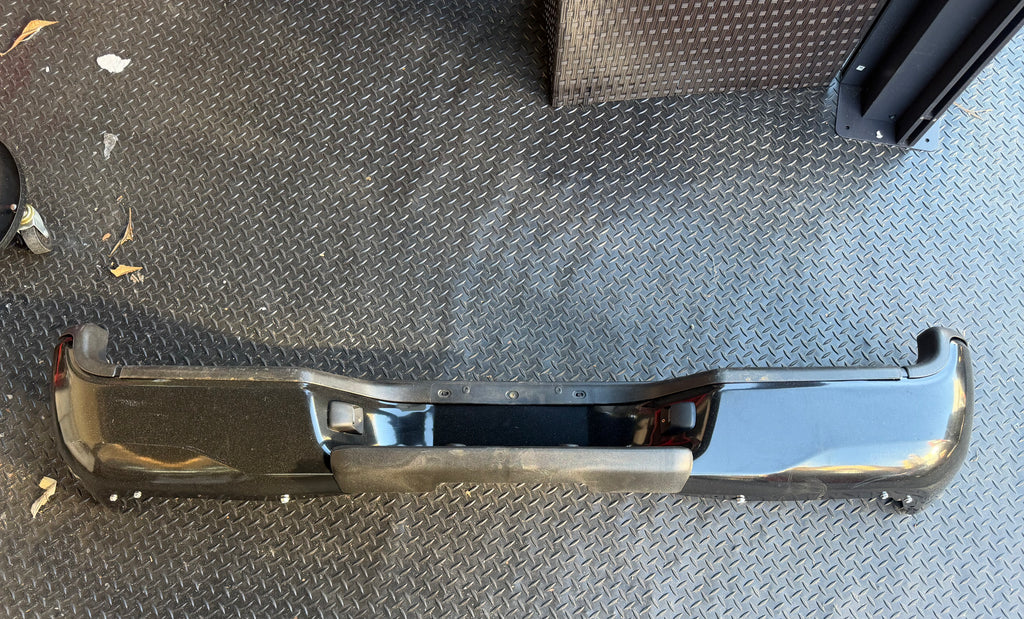 AS IS 05-15 TOYOTA TACOMA REAR BLACK BUMPER NO BRACKETS NO HARDWARE