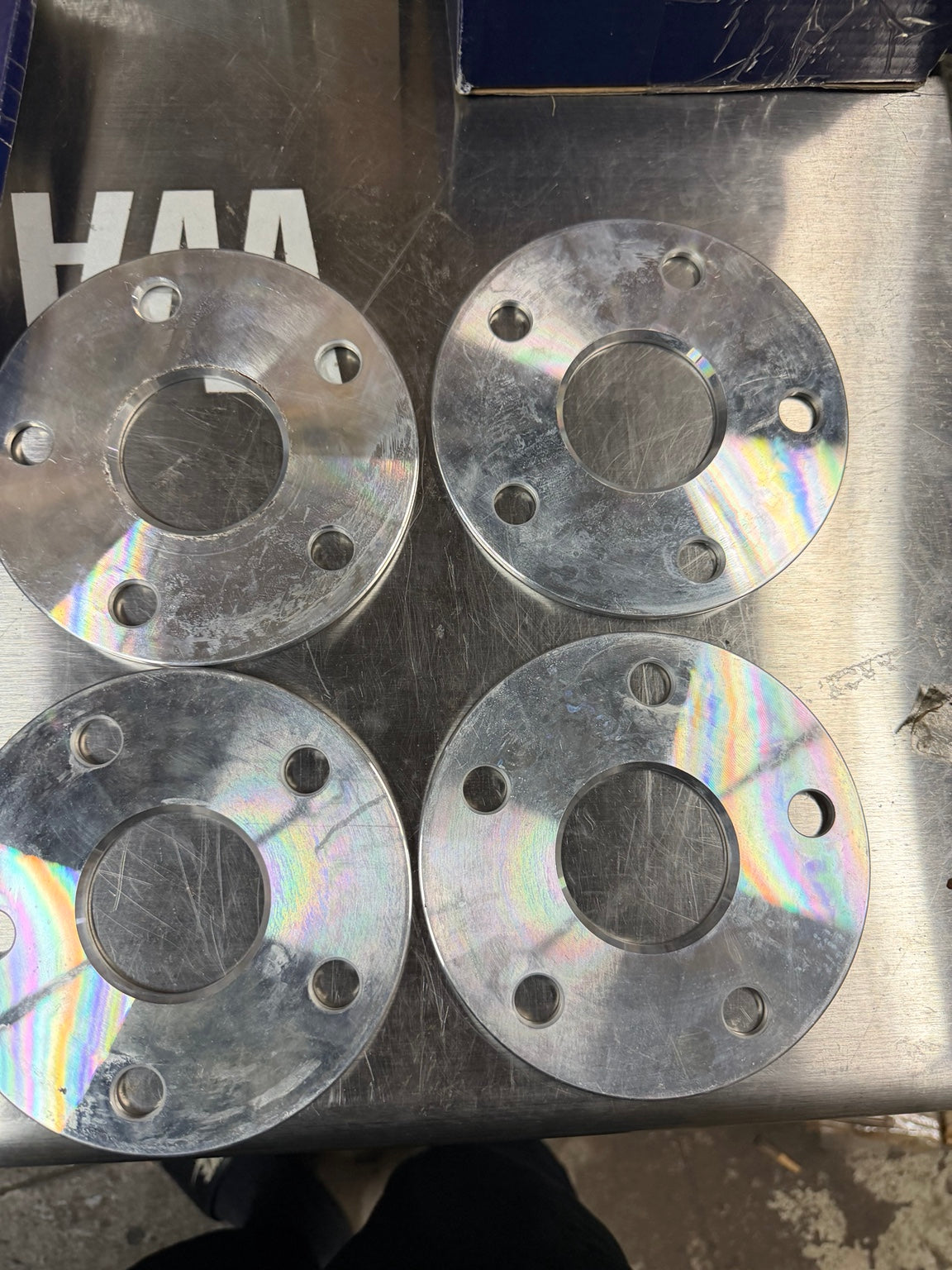 Reverse sides showing the condition of all four spacers