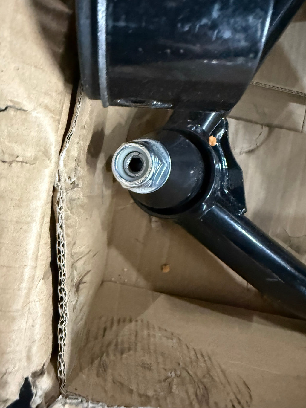 Actual slightly used control arm ball joint and black finish detail