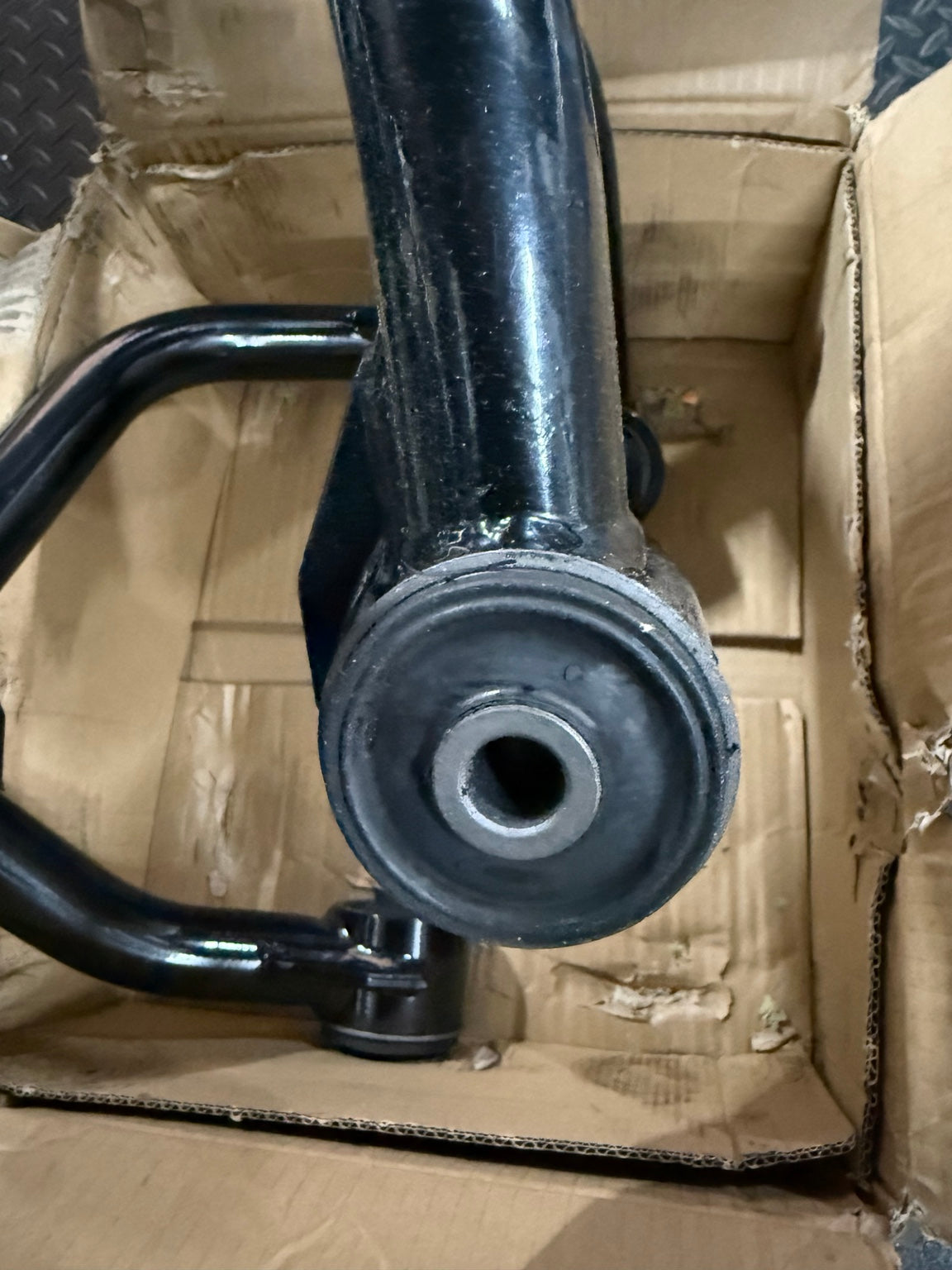 Actual control arm rubber bushing and surface scuffs