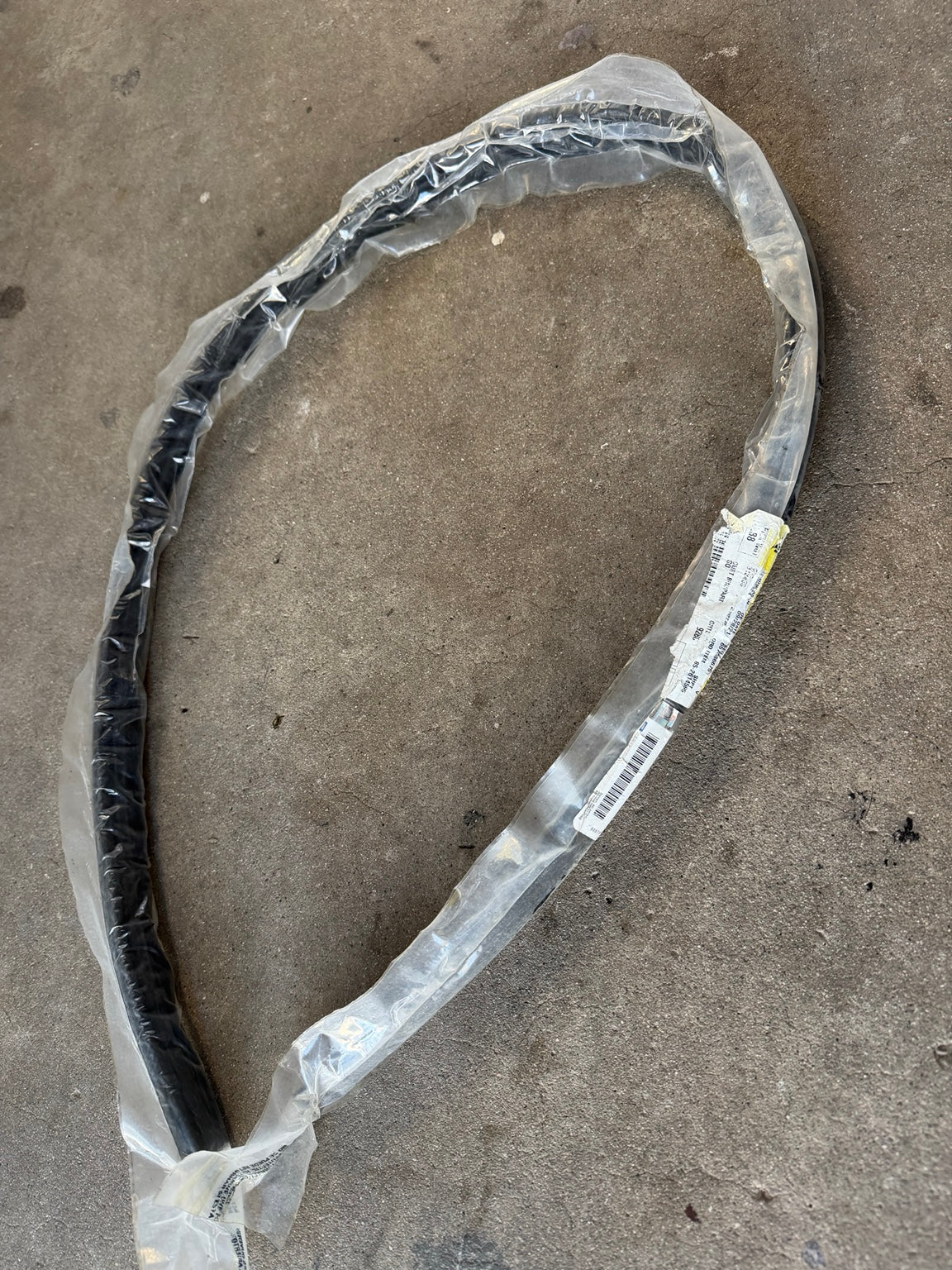 Actual GM 22853998 door opening weatherstrip in package