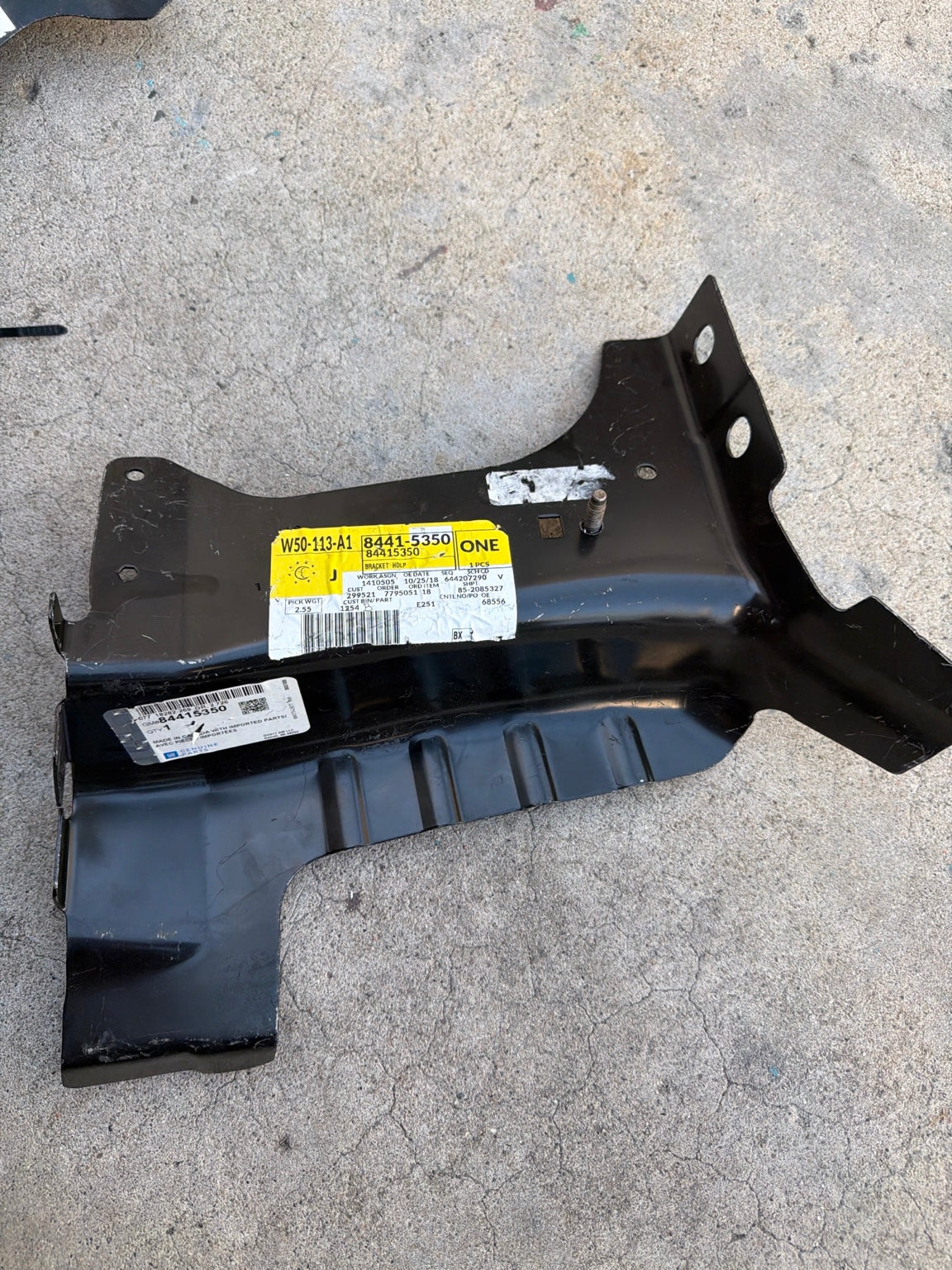 Actual GM 84415350 Headlamp Bracket Assembly in Tote 37A
