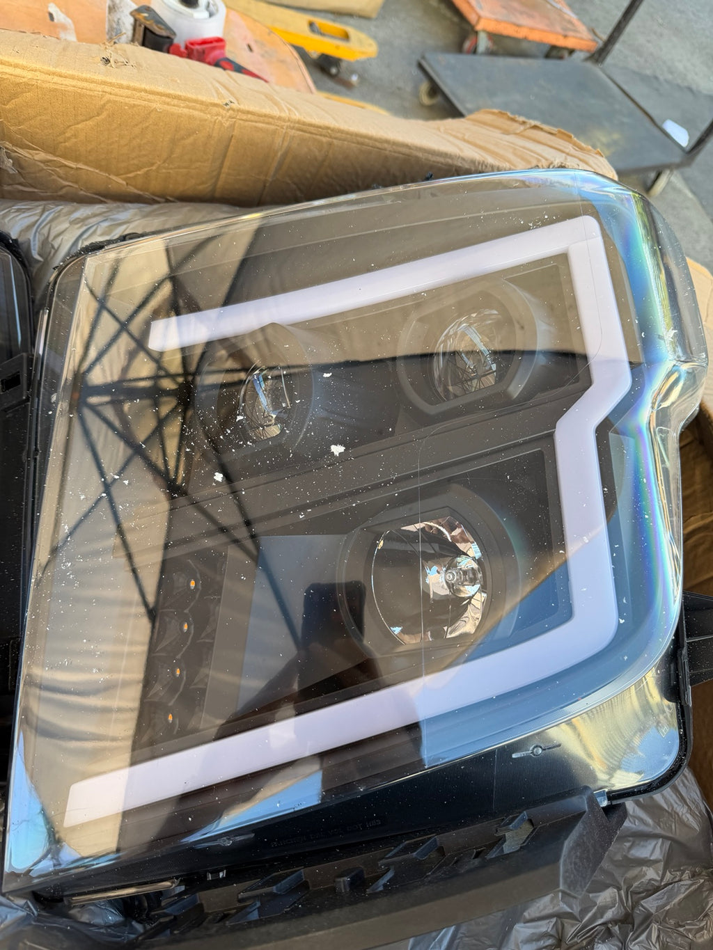 Actual headlight lens and housing detail