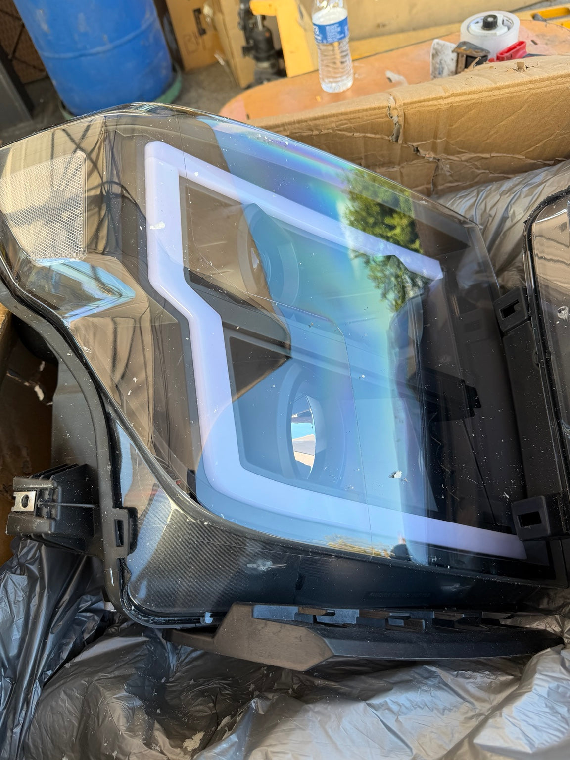 Actual headlight lens and housing detail
