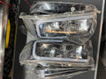 Actual four-piece black clear headlight and bumper lamp set