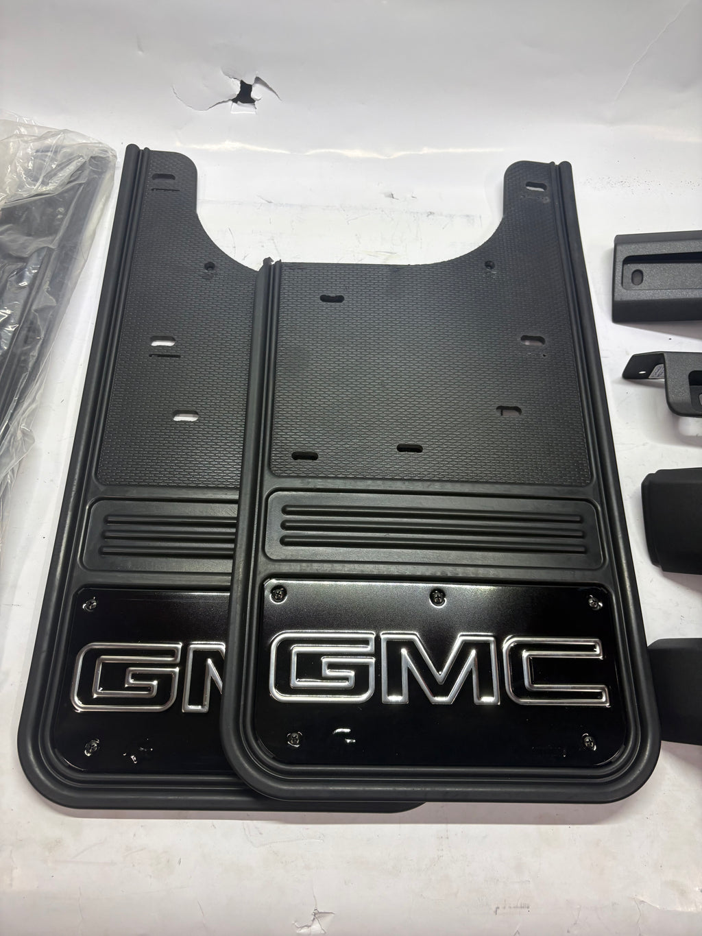 19432688 | 2020-2026 GMC SIERRA Front and Rear Rubber No-Drill Gatorback Mud Flap Kit with Silver Outlined GMC Logo by Truck Hardware - Associated Accessories