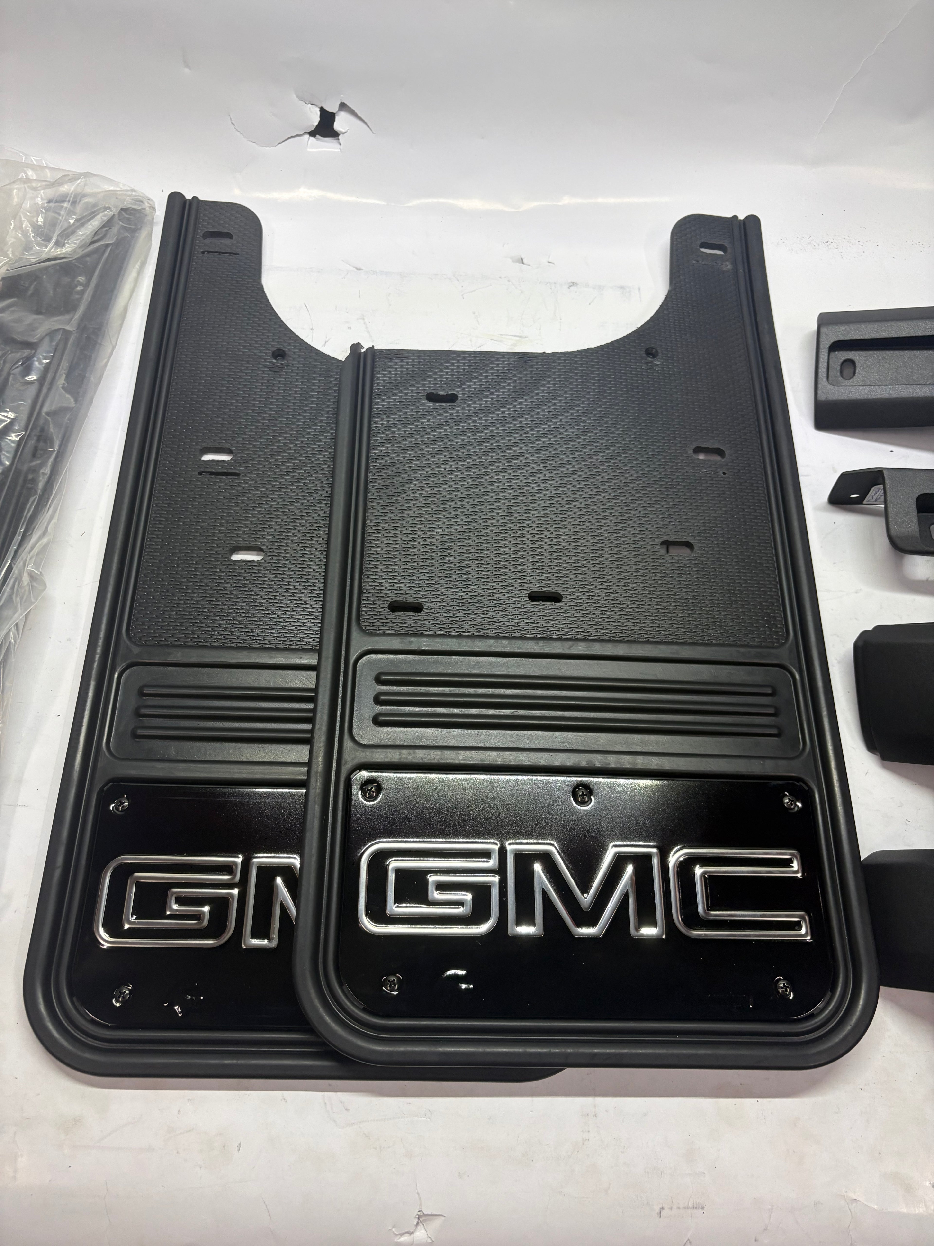 19432688 | 2020-2026 GMC SIERRA Front and Rear Rubber No-Drill Gatorback Mud Flap Kit with Silver Outlined GMC Logo by Truck Hardware - Associated Accessories
