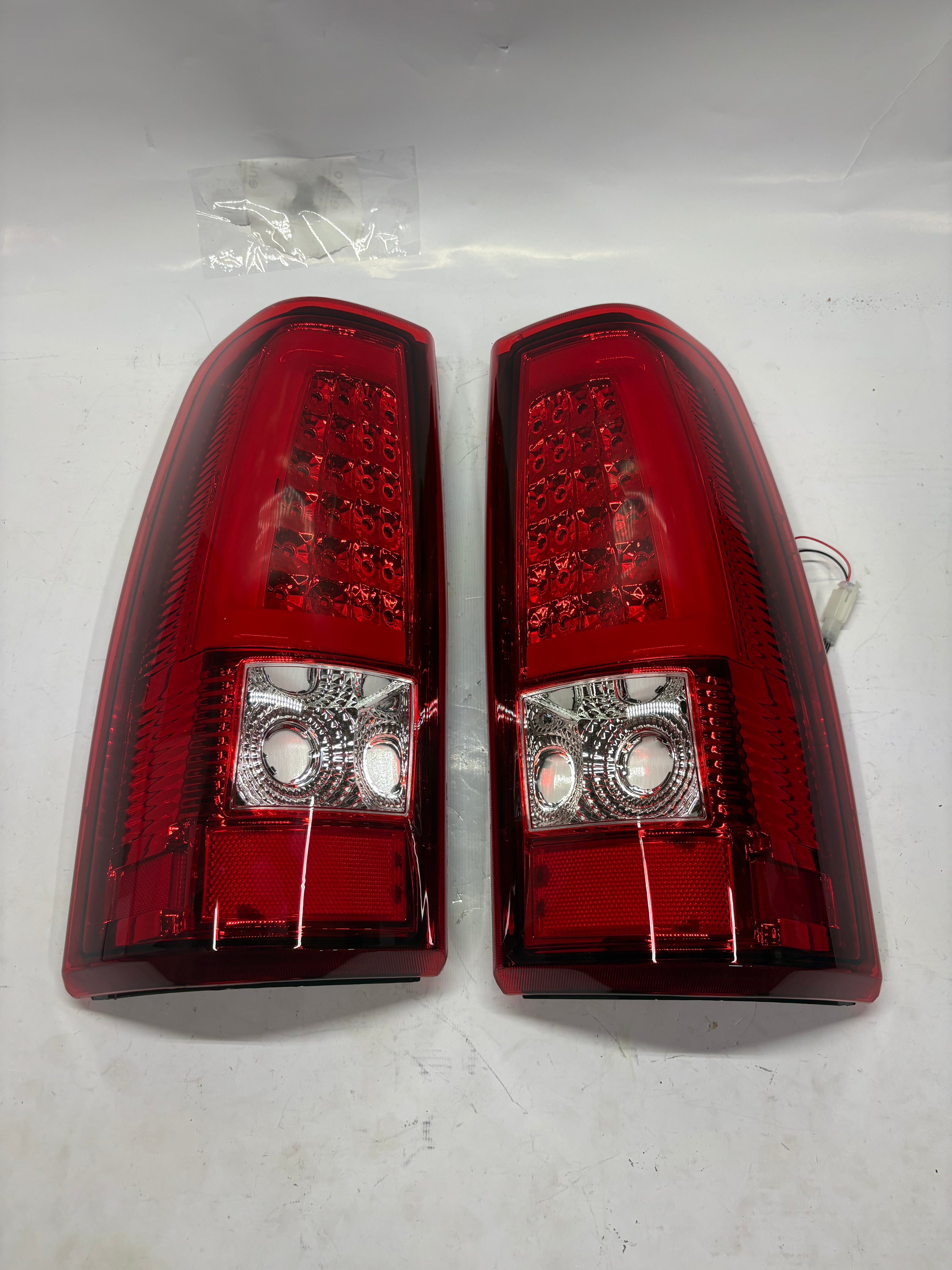 03-06 Chevy Silverado GMC Sierra red led taillights brake lamps pair