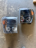 OPEN BOX 11-16 FORD F-250 / F-350 / F-450 / F-550 SUPER DUTY BLACK HOUSING HEADLIGHTS W/ DUAL LED HALO RINGS & PROJECTOR LIGHTING