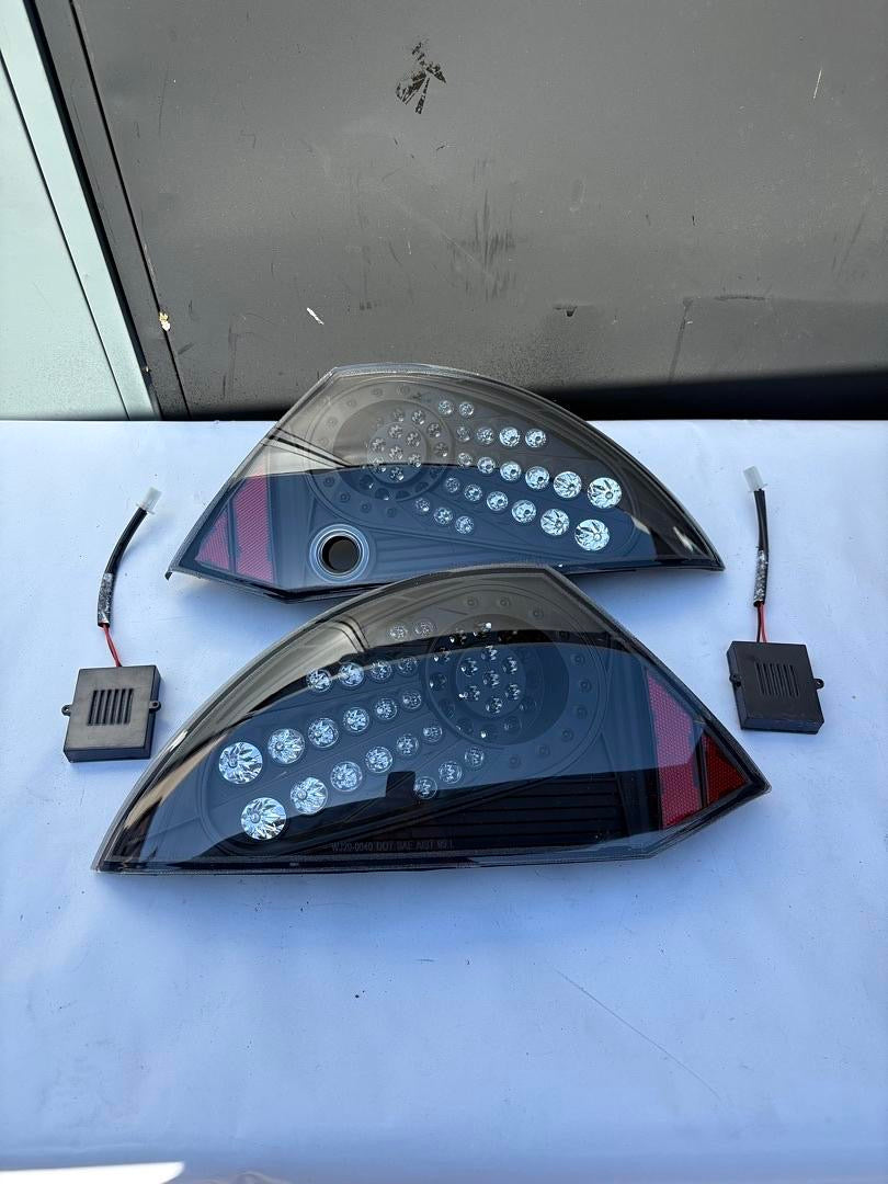 00-05 MITSUBISHI ECLIPSE LED TAIL LIGHTS BLACK CLEAR