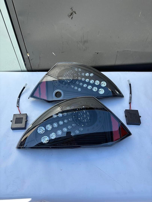 00-05 MITSUBISHI ECLIPSE LED TAIL LIGHTS BLACK CLEAR