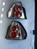 04-07 CHEVY MALIBU CHROME HOUSING TAILLIGHTS
