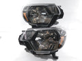 REFURBISHED 12-15 TOYOTA TACOMA BLACK AMBER HEADLIGHTS