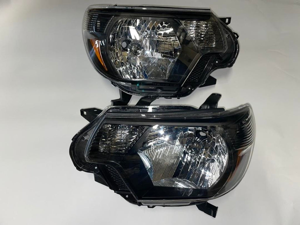 REFURBISHED 12-15 TOYOTA TACOMA BLACK AMBER HEADLIGHTS
