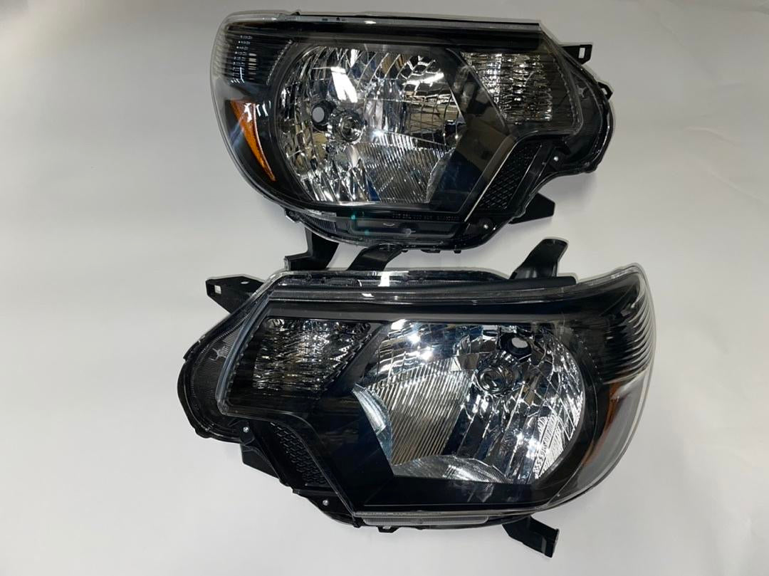 REFURBISHED 12-15 TOYOTA TACOMA BLACK AMBER HEADLIGHTS