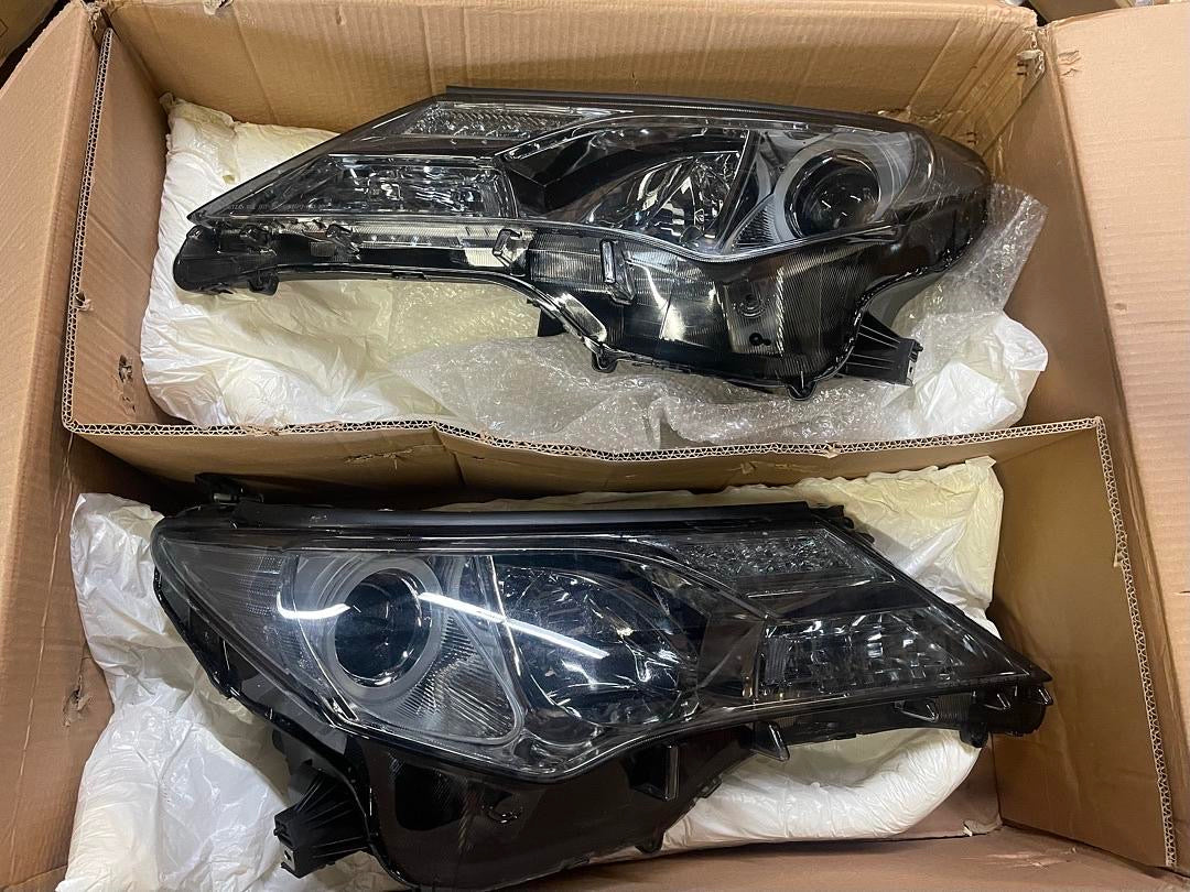 REFURBISHED 13-15 TOYOTA RAV4 BLACK HOUSING AND CLEAR WITH PROJECTOR HEADLIGHTS