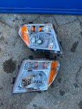 DEPO 05-07 NISSAN FRONTIER / NISSAN PATHFINDER CHROME AMBER HEADLIGHTS