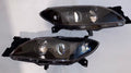 04-09 MAZDA 3 4DR BLACK HOUSING AND CLEAR PROJECTOR HEADLIGHTS