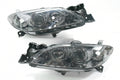 04-09 MAZADA 3 4DR CHROME HOUSING AND SMOKED WITH PROJECTOR HEADLIGHTS