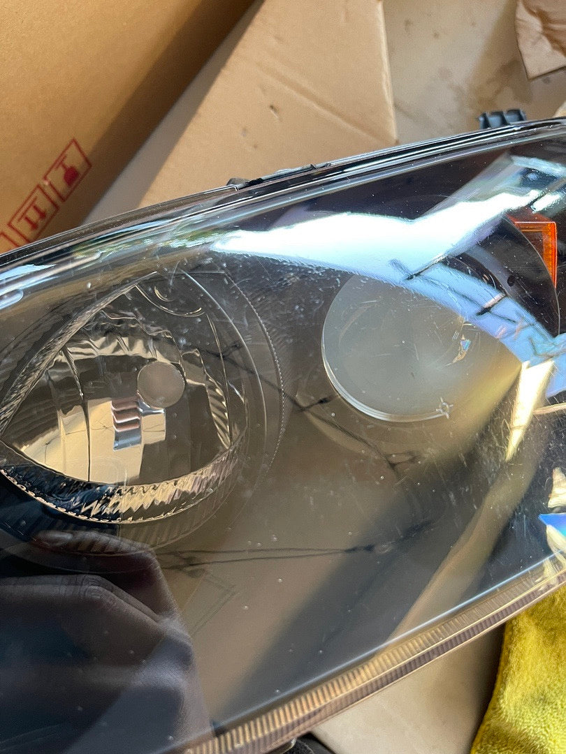 OB 04-09 MAZDA 3 4DR BLACK HOUSING AND CLEAR PROJECTOR HEADLIGHTS