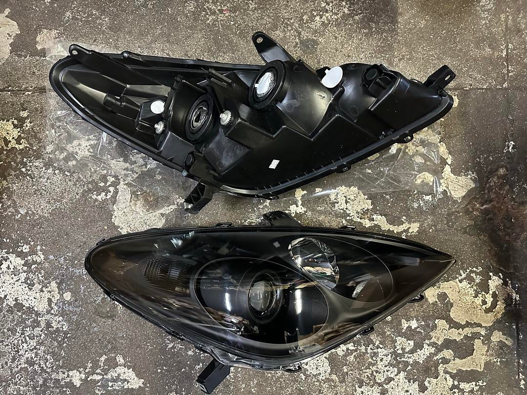 04-06 LEXUS ES300 BLACK HOUSING HEADLIGHTS