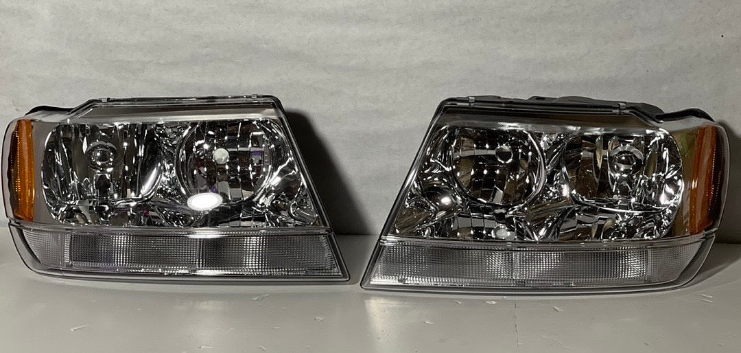 99-04 JEEP GRAND CHEROKEE CHROME HOUSING AMBER CORNER HEADLIGHTS
