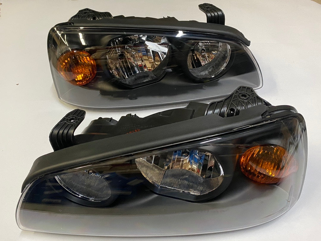 04-06 HYUNDAI ELANTRA BLACK HOUSING AMBER REFLECTORS HEADLIGHTS