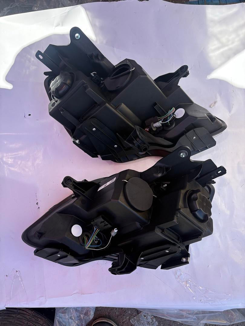 07-12 GMC ACADIA FACTORY HALOGEN BLACK AMBER HEADLIGHTS