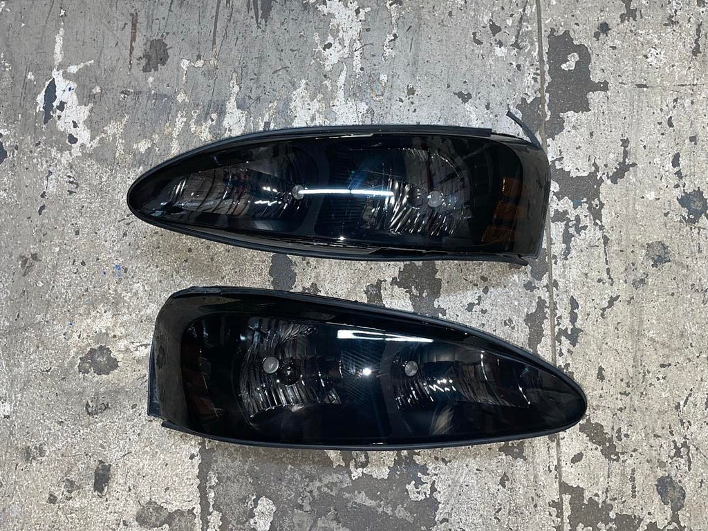 04-08 PONTIAC GRAND PRIX black smoked amber headlights