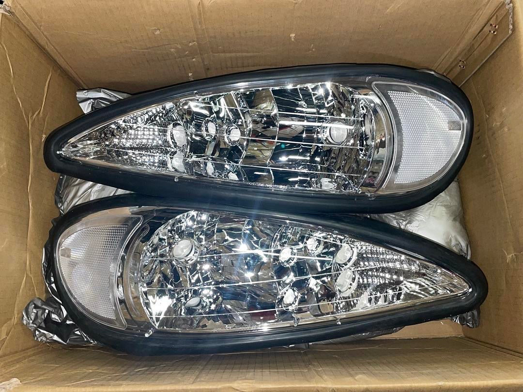 CHROME HOUSING CLEAR SIDE HEADLIGHTS REPLACEMENT FOR 99-05 GRAND AM
