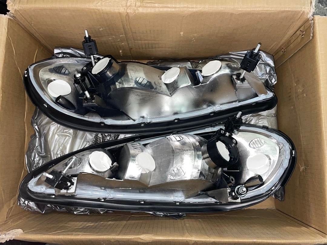 CHROME HOUSING CLEAR SIDE HEADLIGHTS REPLACEMENT FOR 99-05 GRAND AM