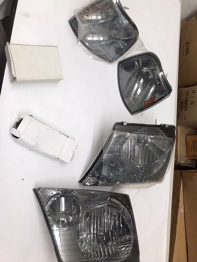 02-05 FORD EXPLORER Amber smoked pair of headlights