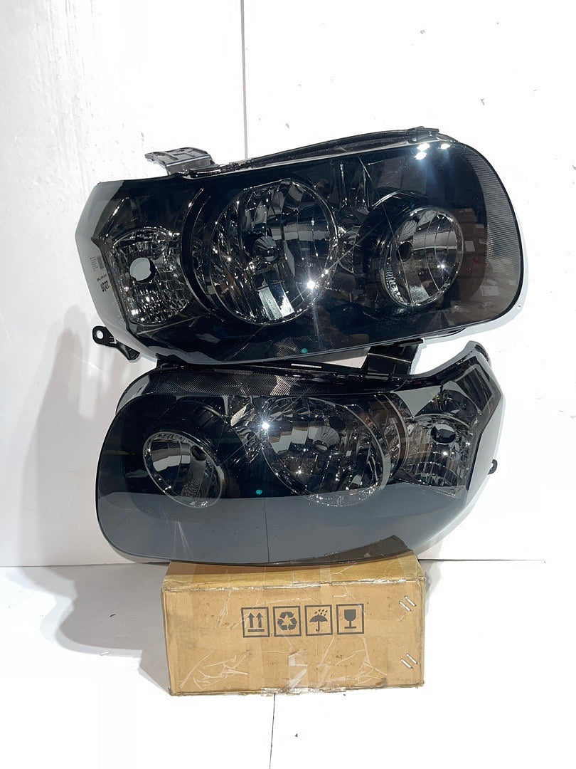 05-07 FORD ESCAPE SMOKED HEADLIGHTS